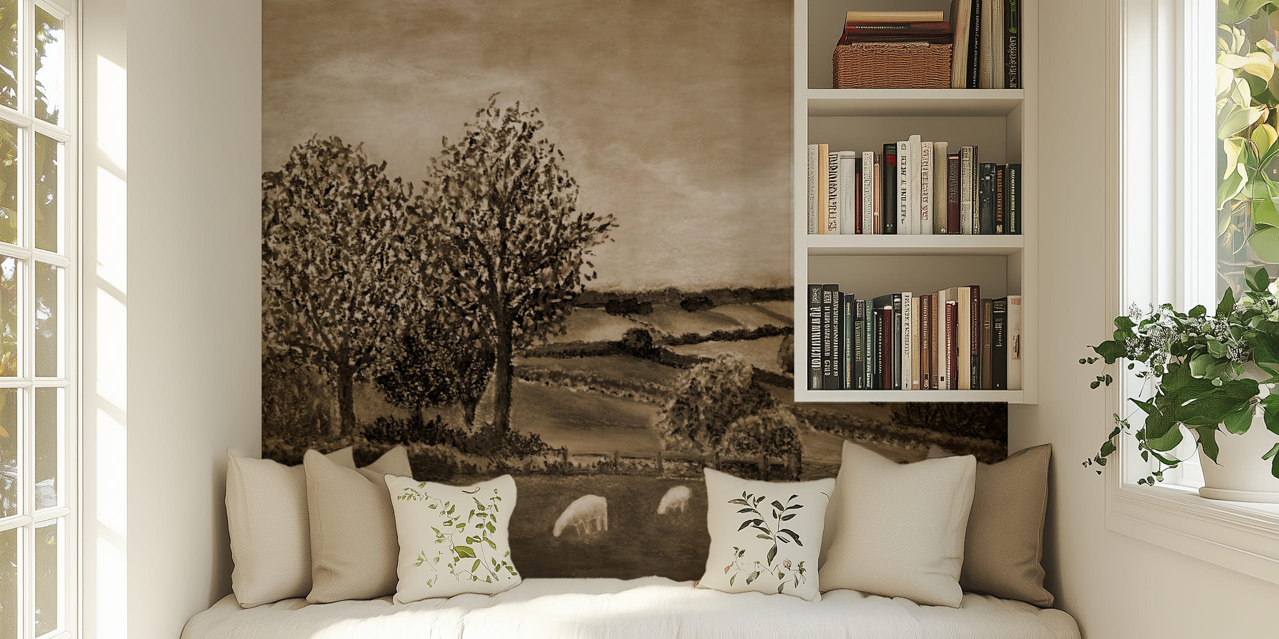 vintage-sepia-pastoral-mural-wallpaper-reading-nook Vintage sepia pastoral mural wallpaper behind a cushioned window seat with built-in bookshelves and botanical throw pillows.